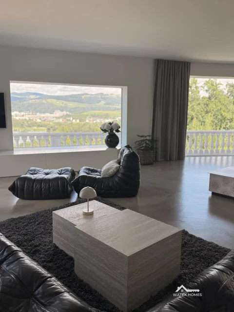 Wohnbereich mit westseitigem Panoramafenster, Einfamilienhaus in Plesching