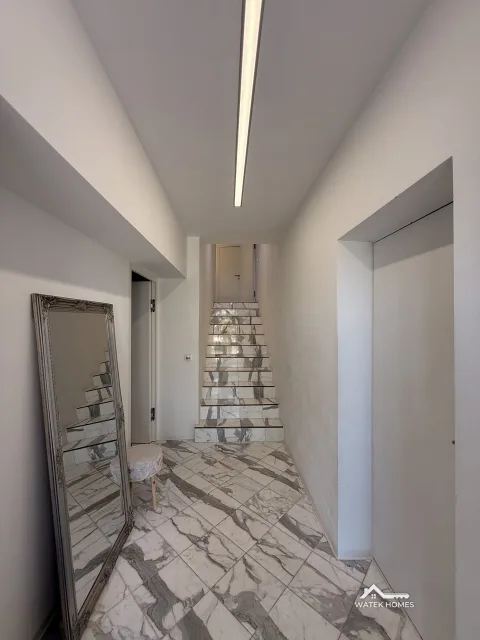 Eingangsbereich mit Marmortreppe, Einfamilienhaus in Plesching